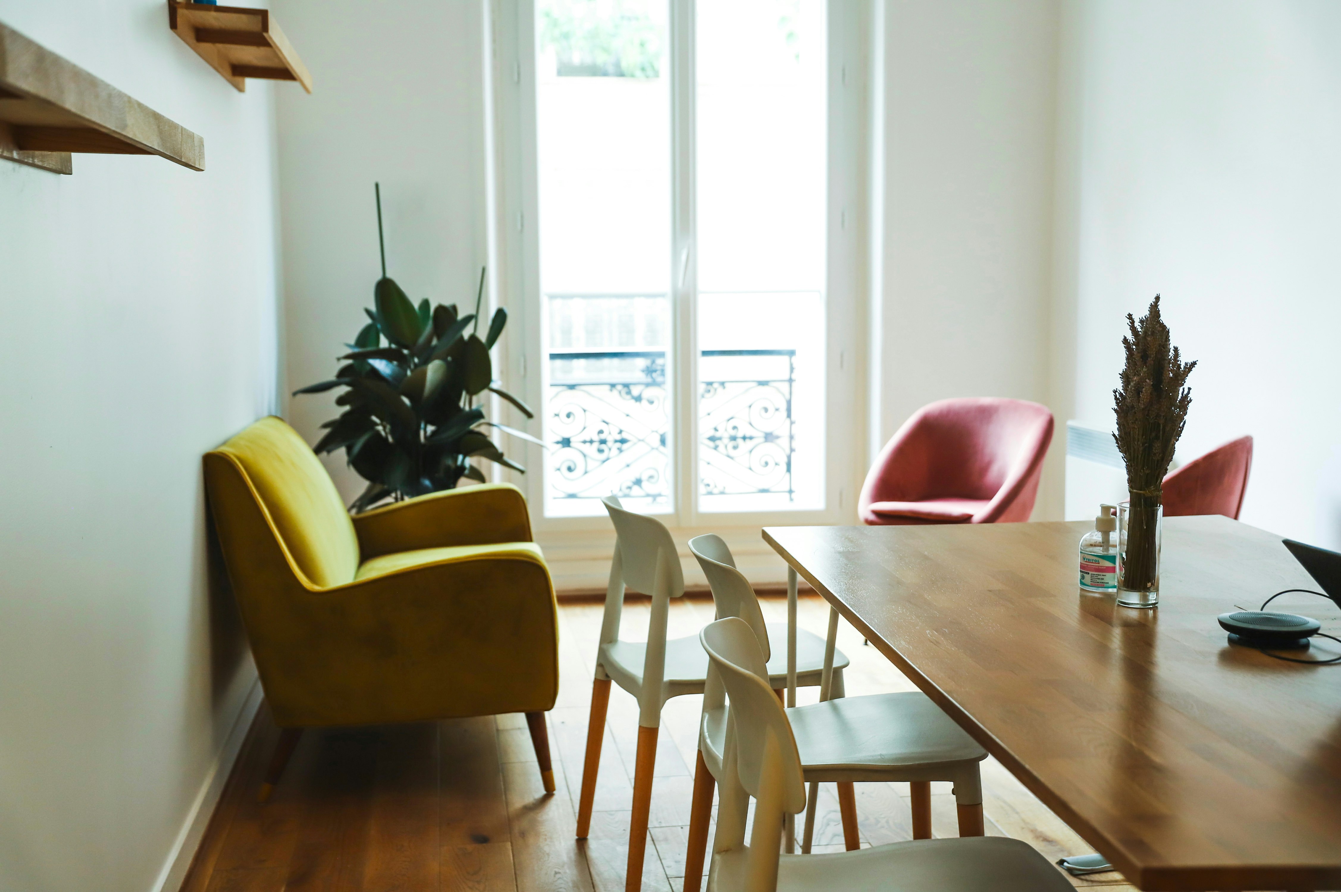 brown wooden table with chairs